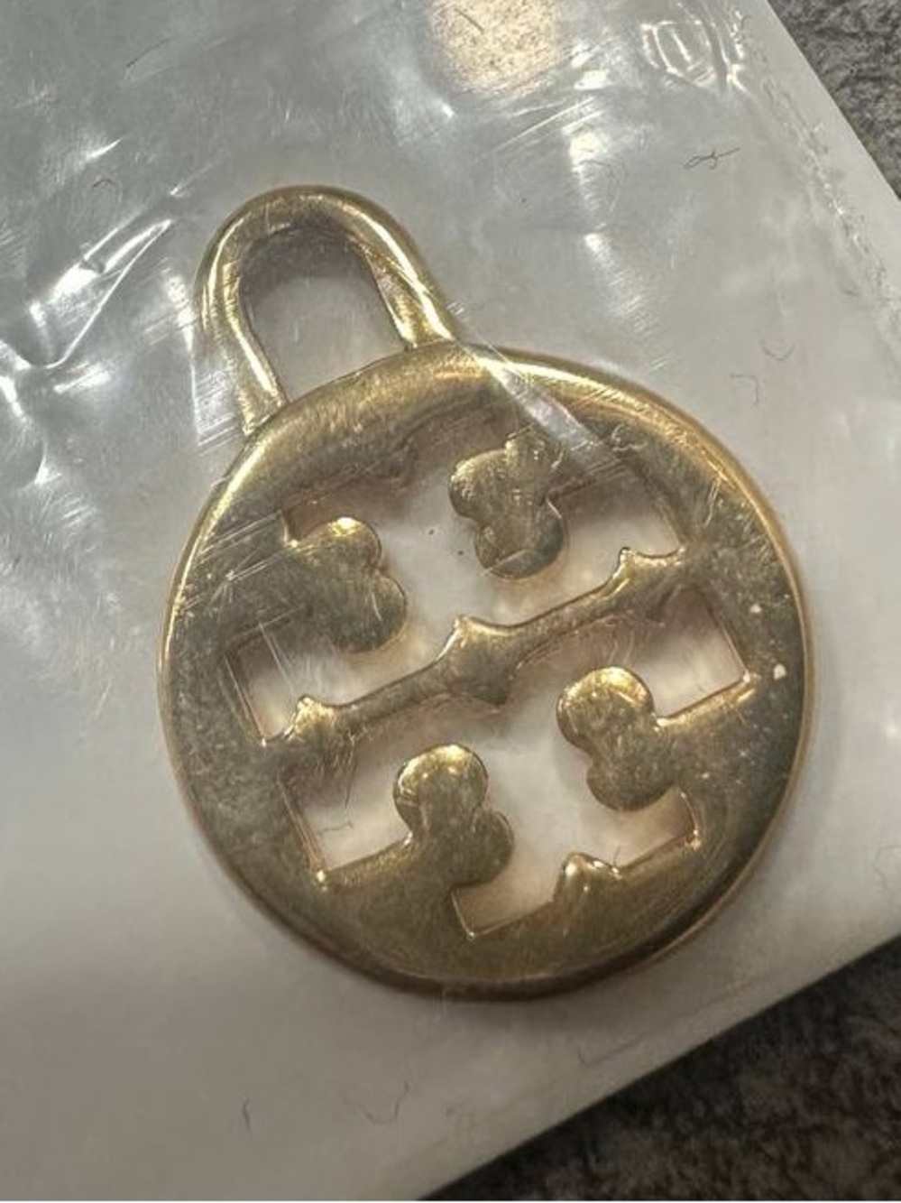 Tory Burch gold pendant